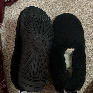 New black furry slippers